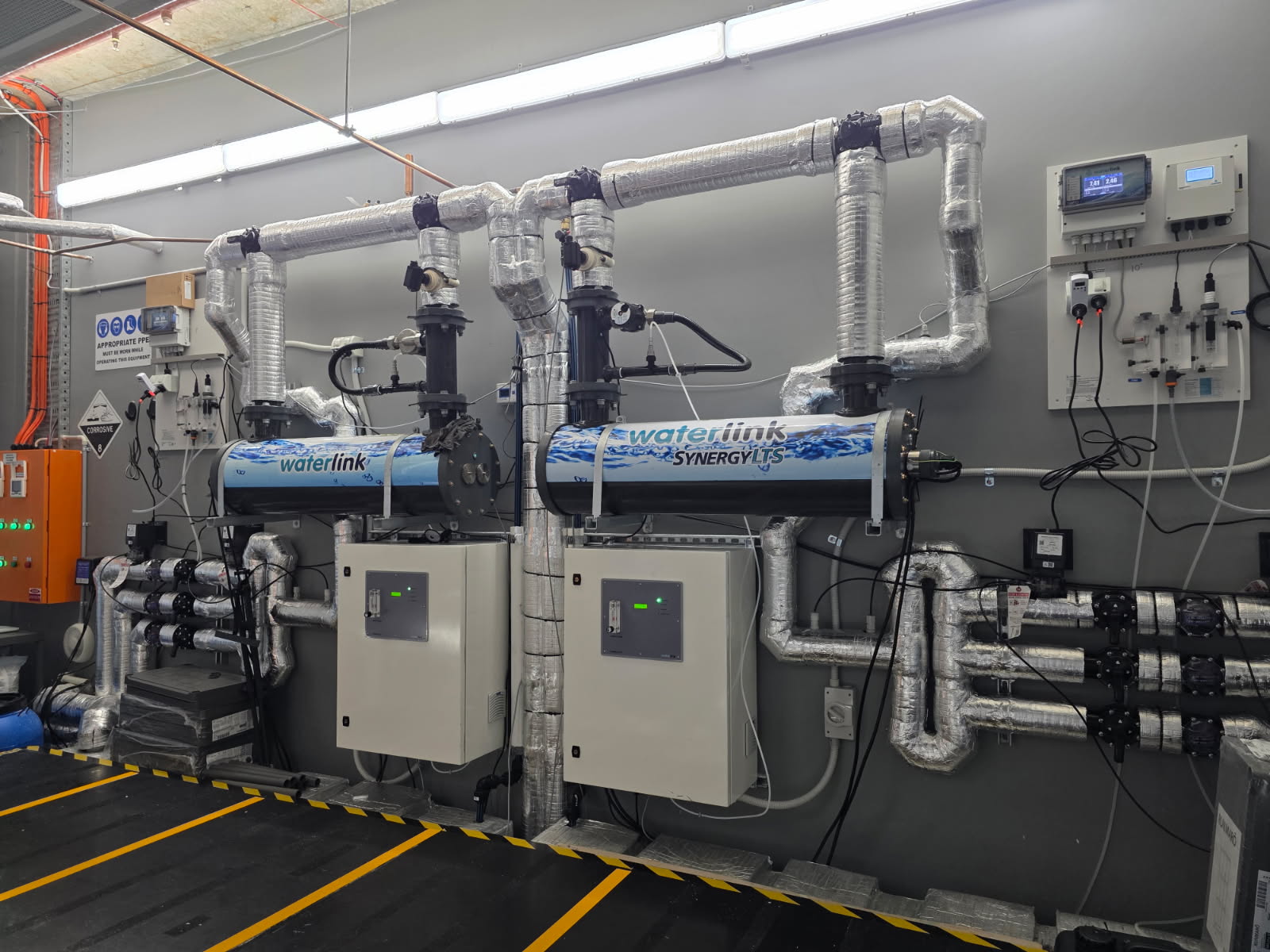 Dedicated commercial plant room with filtration, dosing and temperature control equipment