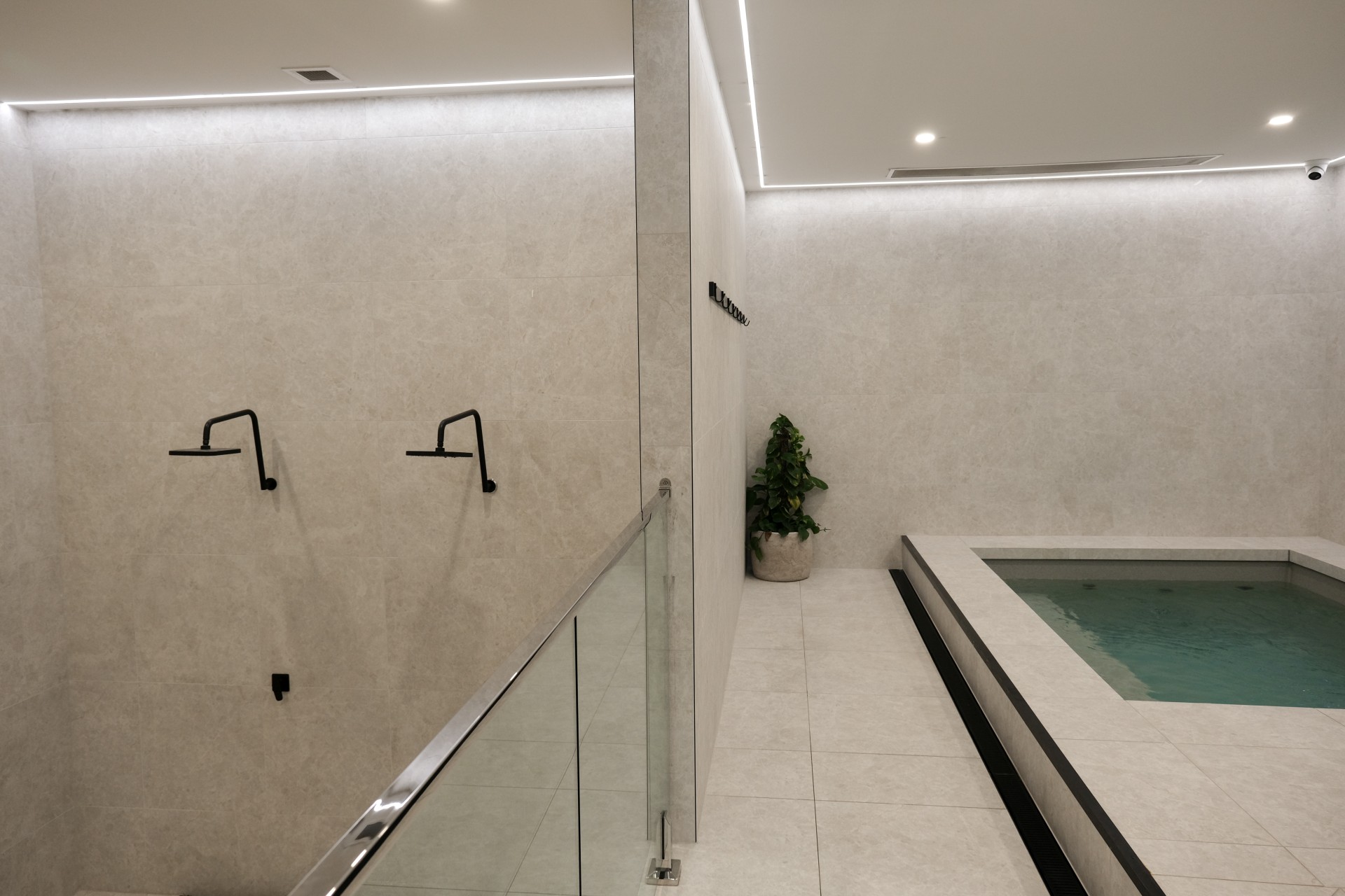 38 degree commercial hot plunge in a tiled recovery room